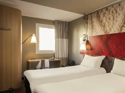 Un ou plusieurs lits dans un hébergement de l'établissement ibis Paris Place d’Italie 13ème