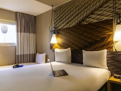 Un ou plusieurs lits dans un hébergement de l'établissement ibis Paris Place d’Italie 13ème