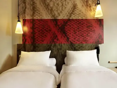 Un ou plusieurs lits dans un hébergement de l'établissement ibis Paris Place d’Italie 13ème