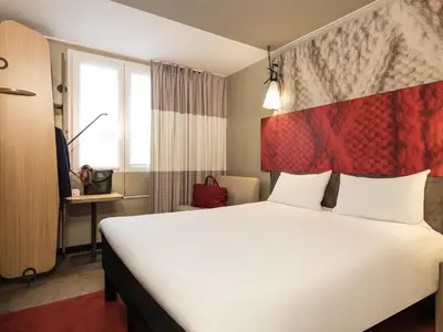 Un ou plusieurs lits dans un hébergement de l'établissement ibis Paris Gare du Nord Château Landon 10ème