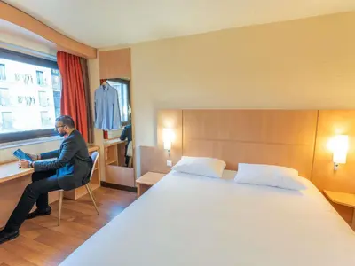 Un ou plusieurs lits dans un hébergement de l'établissement ibis Paris 17 Clichy-Batignolles