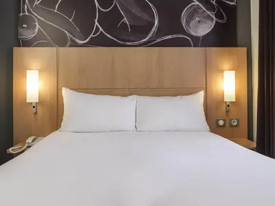 Un ou plusieurs lits dans un hébergement de l'établissement ibis Paris Vaugirard Porte de Versailles