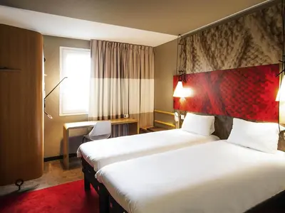 Un ou plusieurs lits dans un hébergement de l'établissement ibis Paris La Defense Courbevoie
