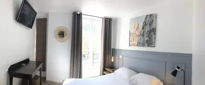Un ou plusieurs lits dans un hébergement de l'établissement Hotel Little Regina
