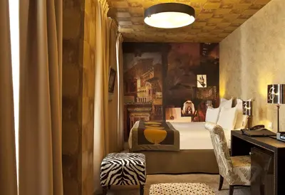 Coin salon dans l'établissement Hôtel Le Bellechasse Saint-Germain