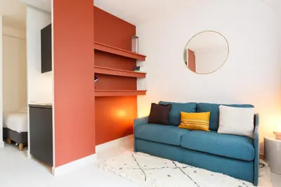 Coin salon dans l'établissement Habitat Parisien - 1BR-1BA for 4 - Marais Bastille