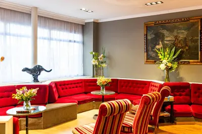 Coin salon dans l'établissement Hotel Claude Bernard Saint-Germain