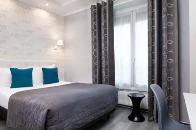 Un ou plusieurs lits dans un hébergement de l'établissement Hôtel de Genève