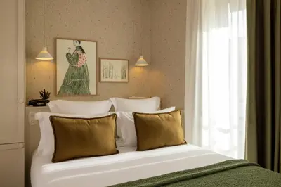 Un ou plusieurs lits dans un hébergement de l'établissement Le Petit Oberkampf Hotel & Spa