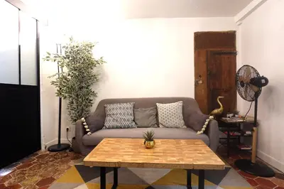 Coin salon dans l'établissement Cosy Flat in Le Marais