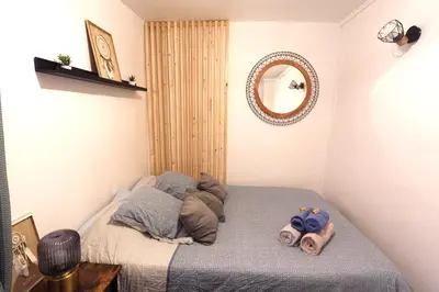 Un ou plusieurs lits dans un hébergement de l'établissement Cosy Flat in Le Marais