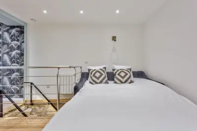 Un ou plusieurs lits dans un hébergement de l'établissement 86 - Urban Charming Apartment