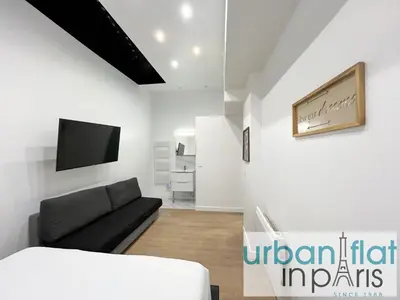 Télévision ou salle de divertissement dans l'établissement 52 - Urban Collection Grands Boulevards