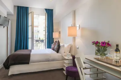 Un ou plusieurs lits dans un hébergement de l'établissement Hotel Le Placide Saint-Germain Des Prés