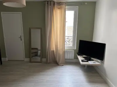 Télévision ou salle de divertissement dans l'établissement Mb property