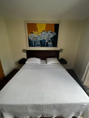 Un ou plusieurs lits dans un hébergement de l'établissement Hôtel Tingis