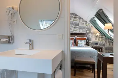 Un ou plusieurs lits dans un hébergement de l'établissement Hotel le 46