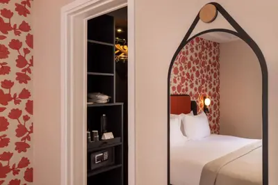 Un ou plusieurs lits dans un hébergement de l'établissement Hotel le 46