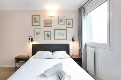 Un ou plusieurs lits dans un hébergement de l'établissement Cozy studio 10 min from Eiffel Tower Invalides Beaugrenelle