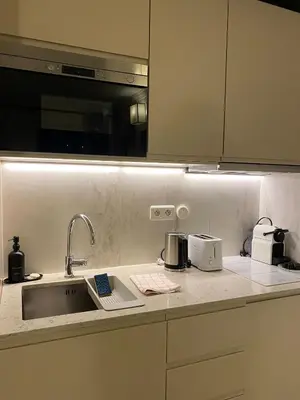 Cuisine ou kitchenette dans l'établissement Cozy studio 10 min from Eiffel Tower Invalides Beaugrenelle