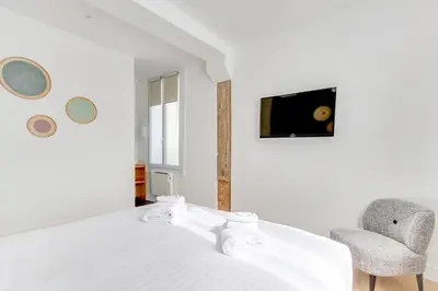 Un ou plusieurs lits dans un hébergement de l'établissement Pick A Flat's Apartment in Le Marais - Rue Saint Apoline