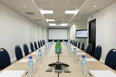 Espace de conférence ou salle de réunion dans l'établissement Simon's Boutique Hôtel