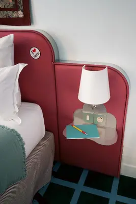 Un ou plusieurs lits dans un hébergement de l'établissement Hôtel Beauregard