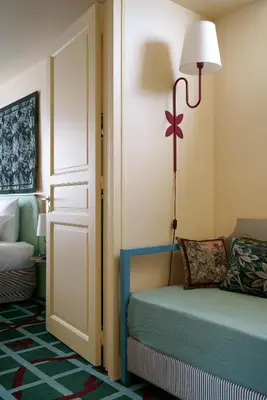 Un ou plusieurs lits dans un hébergement de l'établissement Hôtel Beauregard