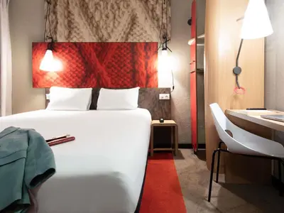 Un ou plusieurs lits dans un hébergement de l'établissement ibis Paris Grands Boulevards Opéra 9e