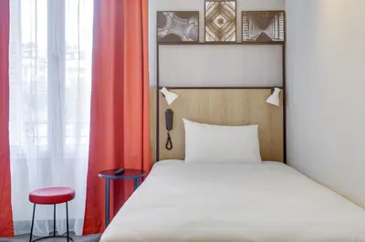 Un ou plusieurs lits dans un hébergement de l'établissement ibis Daumesnil Porte Doree