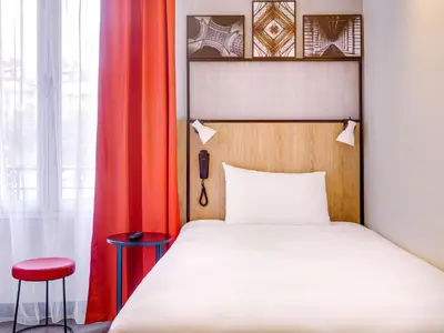 Un ou plusieurs lits dans un hébergement de l'établissement ibis Daumesnil Porte Doree
