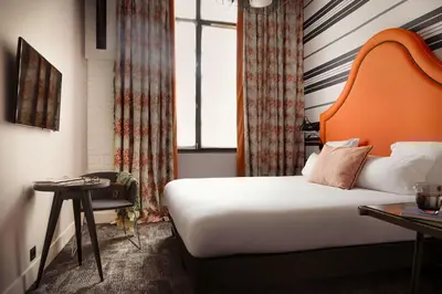 Un ou plusieurs lits dans un hébergement de l'établissement Hôtel Fabric
