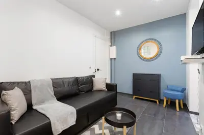 Coin salon dans l'établissement GuestReady - Nice apartment for 6 in Paris