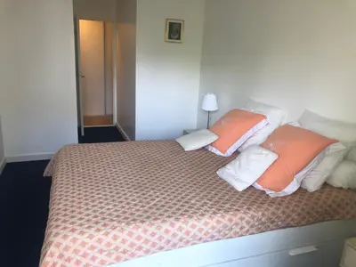 Un ou plusieurs lits dans un hébergement de l'établissement Magnifique appartement proche Paris et La Défense