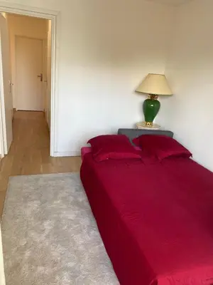 Un ou plusieurs lits dans un hébergement de l'établissement Magnifique appartement proche Paris et La Défense