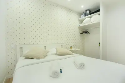 Un ou plusieurs lits dans un hébergement de l'établissement Rent a Room - 253, 2BDR Center of PARIS
