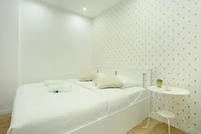 Un ou plusieurs lits dans un hébergement de l'établissement Rent a Room - 253, 2BDR Center of PARIS