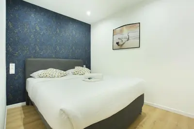 Un ou plusieurs lits dans un hébergement de l'établissement Rent a Room - 253, 2BDR Center of PARIS