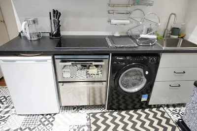 Cuisine ou kitchenette dans l'établissement Montmartre's appartement