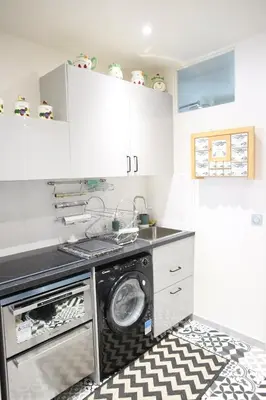 Cuisine ou kitchenette dans l'établissement Montmartre's appartement
