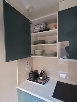 Cuisine ou kitchenette dans l'établissement La maison de toujours