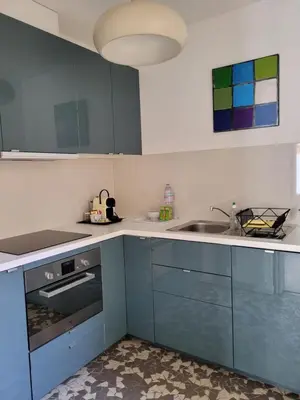 Cuisine ou kitchenette dans l'établissement La maison de toujours