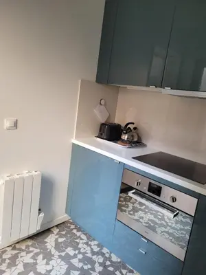 Cuisine ou kitchenette dans l'établissement La maison de toujours