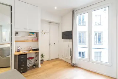 Cuisine ou kitchenette dans l'établissement Cosy studio close to Grands Boulevards - Welkeys