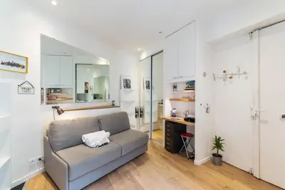 Un ou plusieurs lits dans un hébergement de l'établissement Cosy studio close to Grands Boulevards - Welkeys