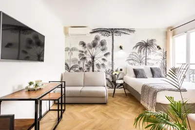 Coin salon dans l'établissement Best Stay Jeuneurs