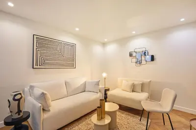Coin salon dans l'établissement Apartment center of Paris by Studio prestige