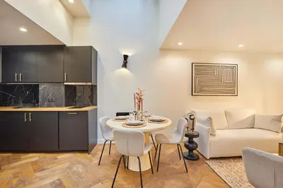 Coin salon dans l'établissement Apartment center of Paris by Studio prestige
