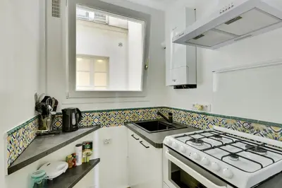 Cuisine ou kitchenette dans l'établissement Unit 009 - Saint Germain des Près (Cherche Midi)
