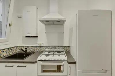Cuisine ou kitchenette dans l'établissement Unit 009 - Saint Germain des Près (Cherche Midi)